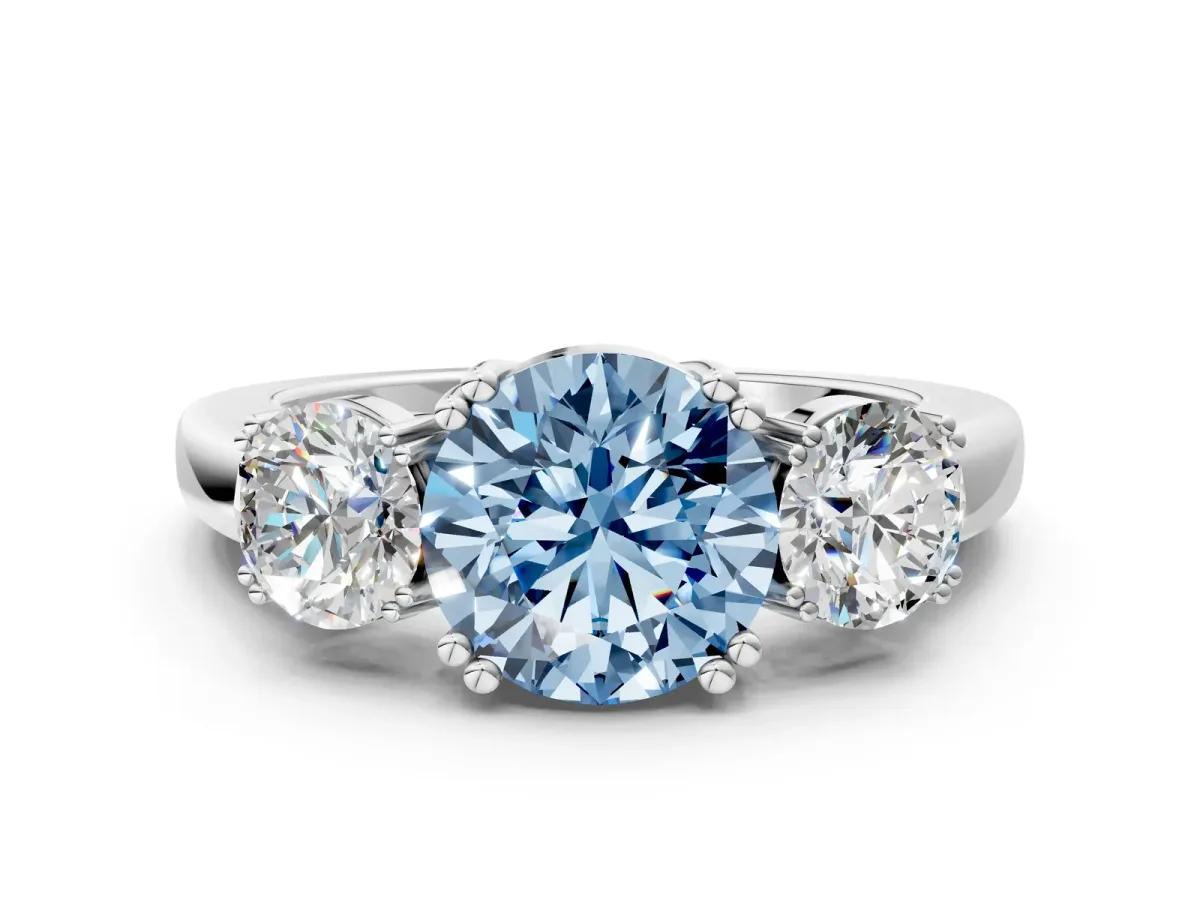 Fancy Blue Three-Stone Round Cut Cut Diamond Ring with Channel Set Band and Four-Prong Setting Silver