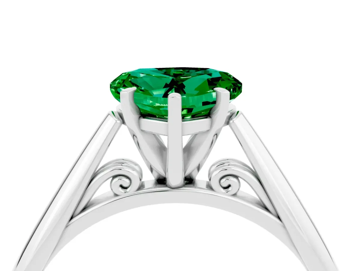 Heart Cut Emerald Solitaire Engagement Ring with Cathedral Setting and Four-Prong Mount White gold