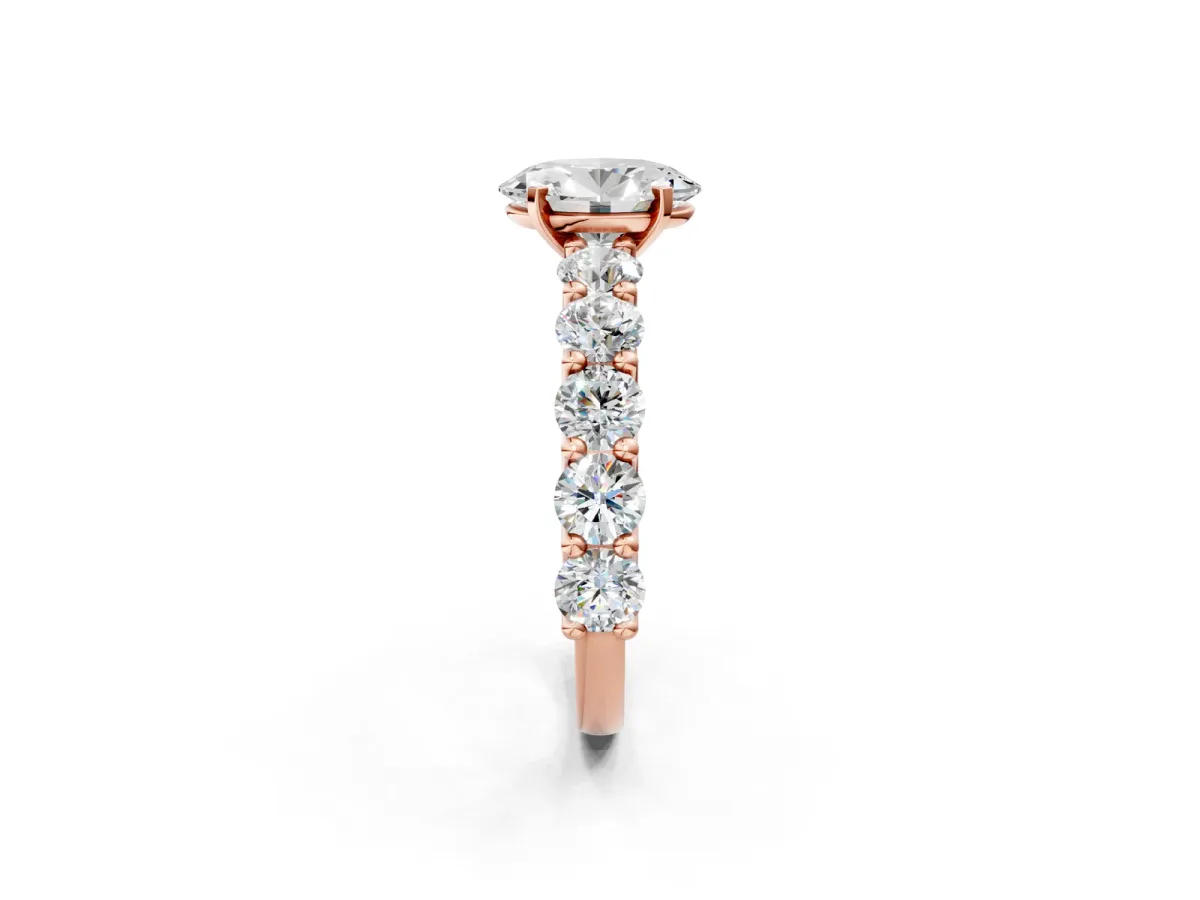 Oval Cut Diamond Prong Setting with Side Stones on a Pave Band Rose gold