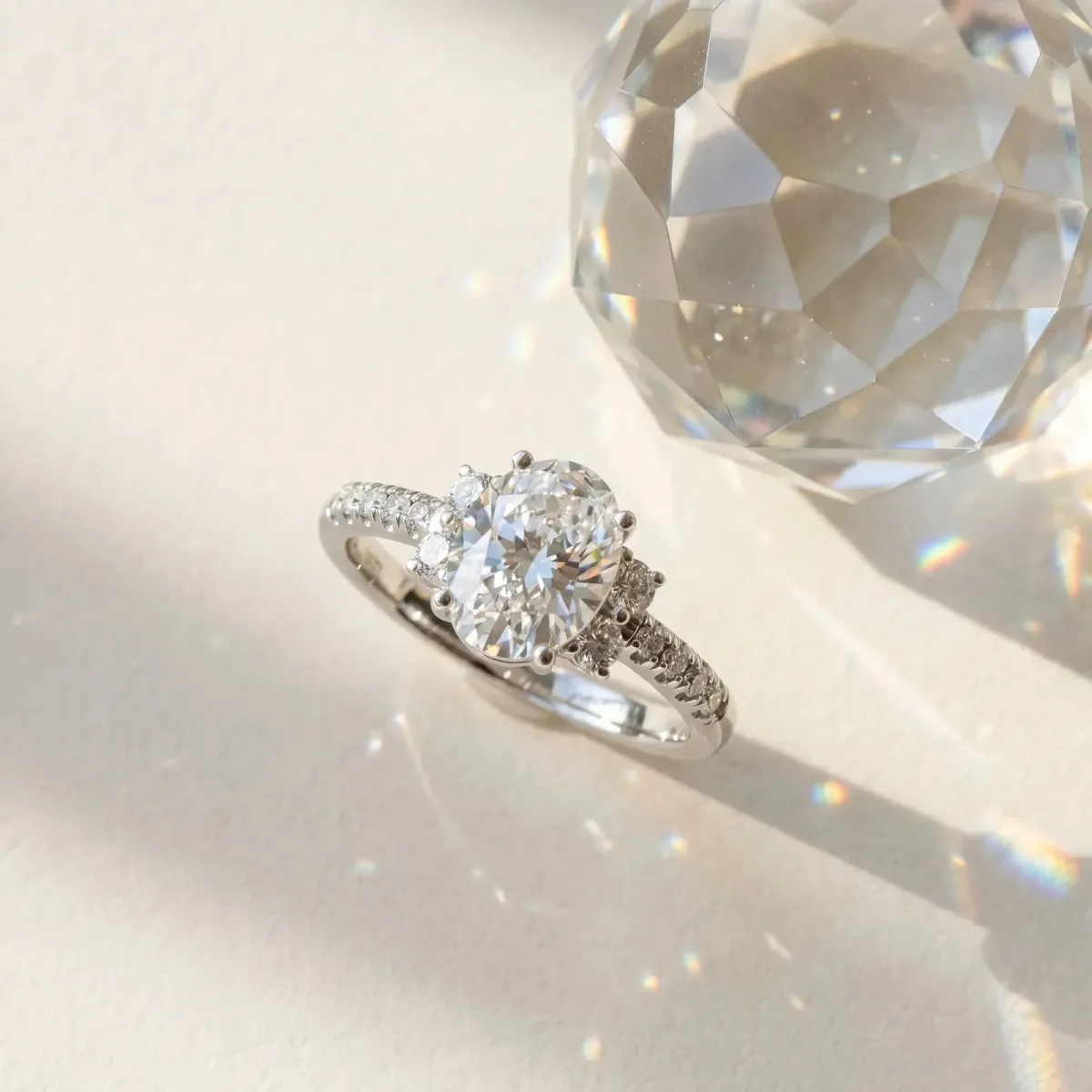 Oval Cut Diamond Three-Stone Pave Band with Four-Prong Setting Silver