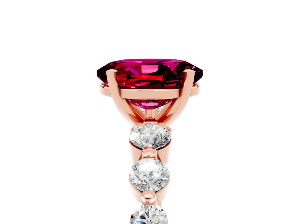 Oval Cut Solitaire Garnet Ring with Pave Band and Four-Prong Setting Rose gold