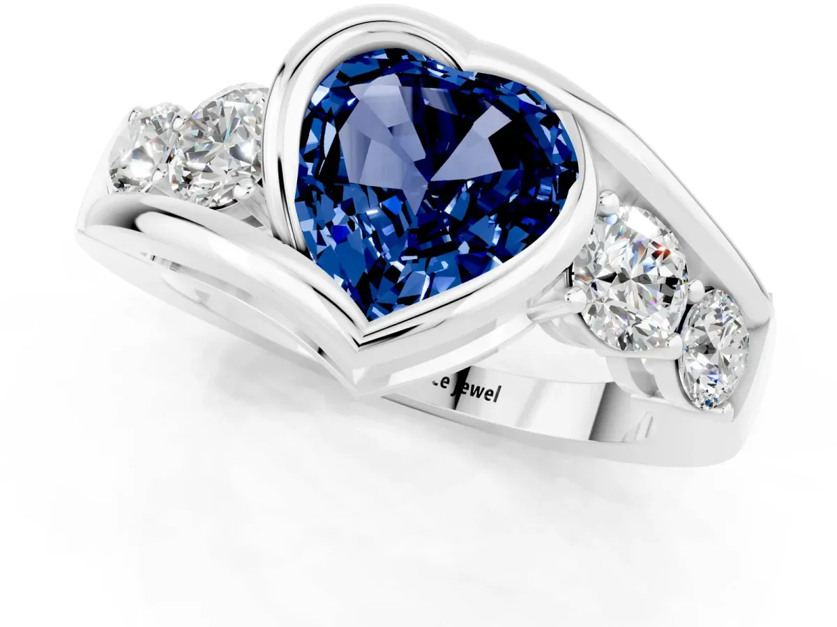 Bezel Set Heart Cut Blue Sapphire Bypass Ring with Round Accents Silver