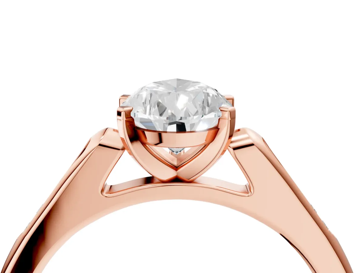 Pear Cut Diamond Solitaire Ring with Channel Set Round Band and Prong Setting Rose gold
