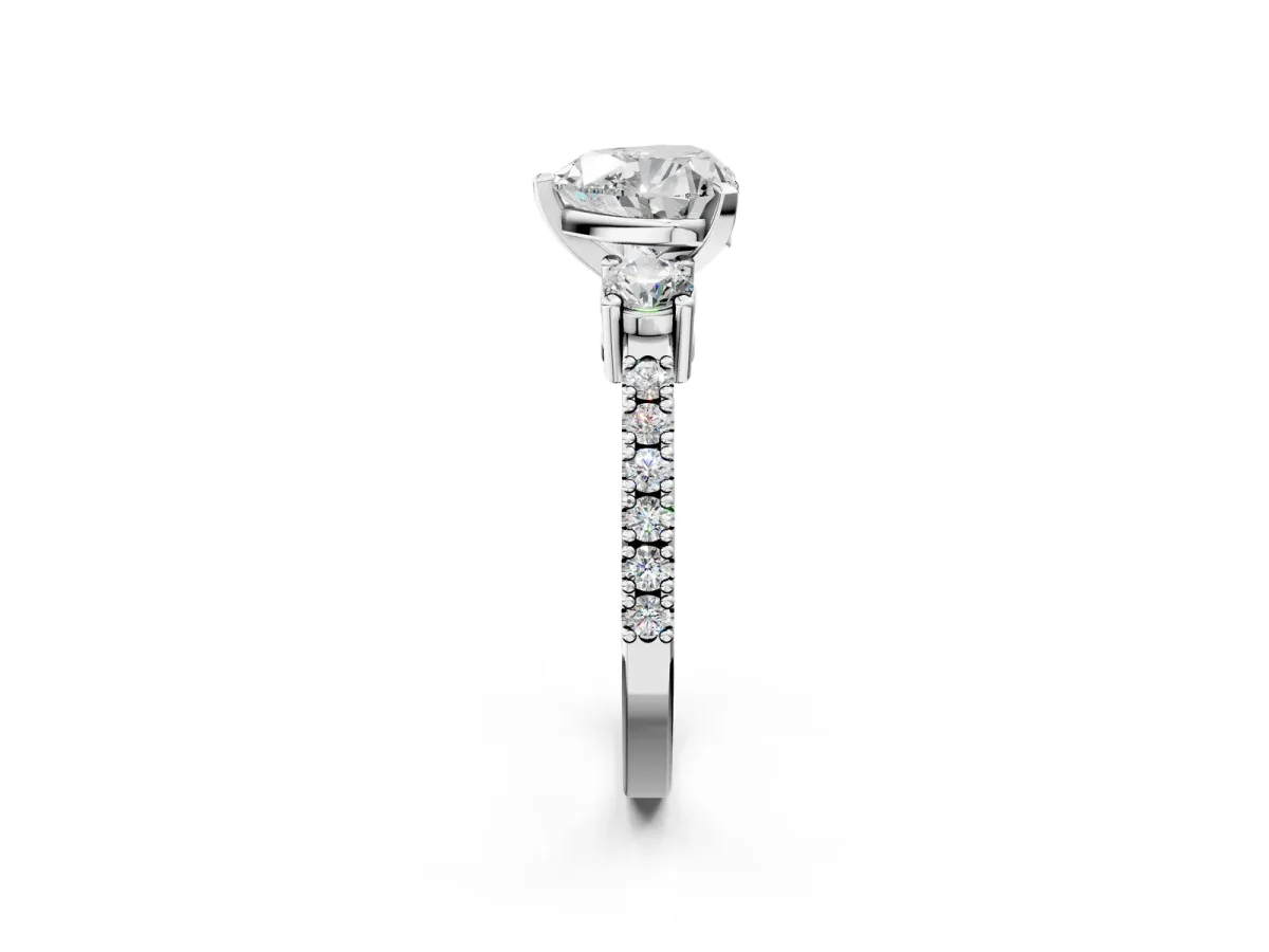 Heart Cut Cut Three-Stone Diamond Pavé Band with Prong Setting Platinum