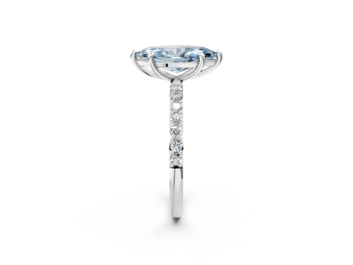 Fancy Blue Marquise Cut Diamond Solitaire Ring with Round Pavé Band and Prong Setting Silver