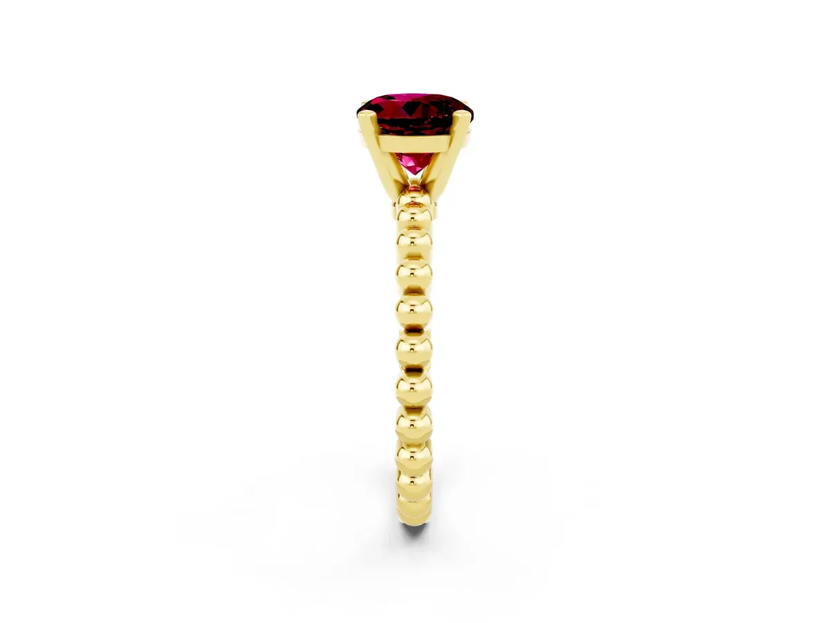 Round Cut Garnet Solitaire Ring with Beaded Band and Prong Setting Yellow gold