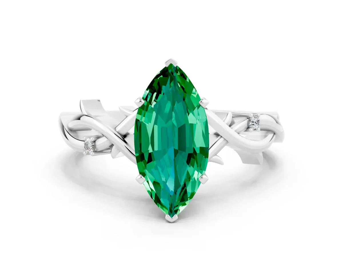 Marquise Cut Emerald Solitaire Ring with Twisted Band and Prong Setting White gold