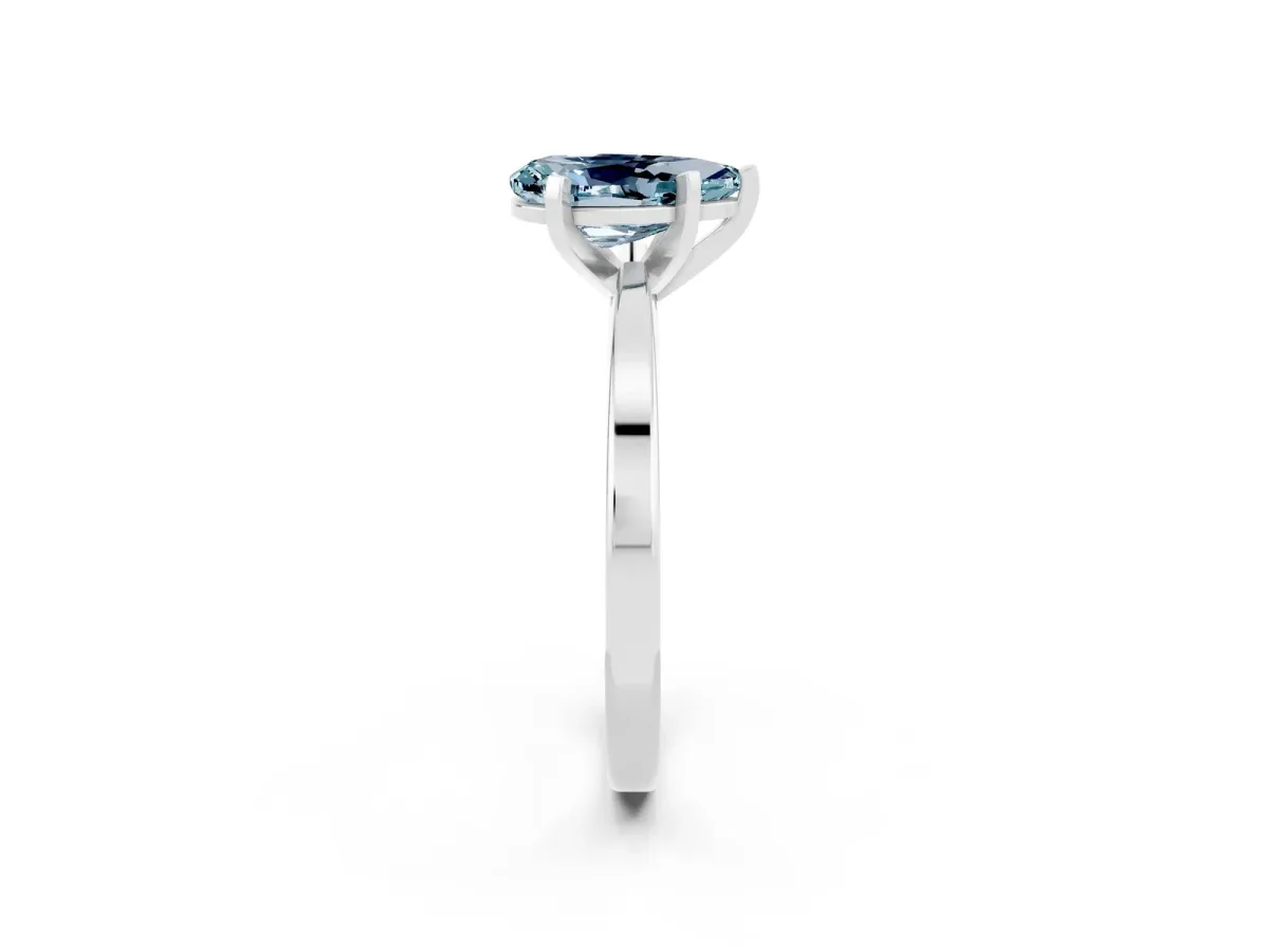 Pear Cut Aquamarine Solitaire Engagement Ring with Classic Band and Four-Prong Setting Silver