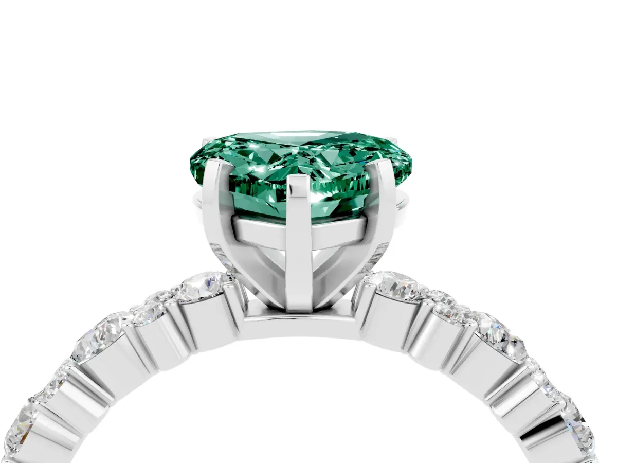 Heart Cut Green Sapphire Side Stone Solitaire Ring with Round and Four-Prong Setting Silver
