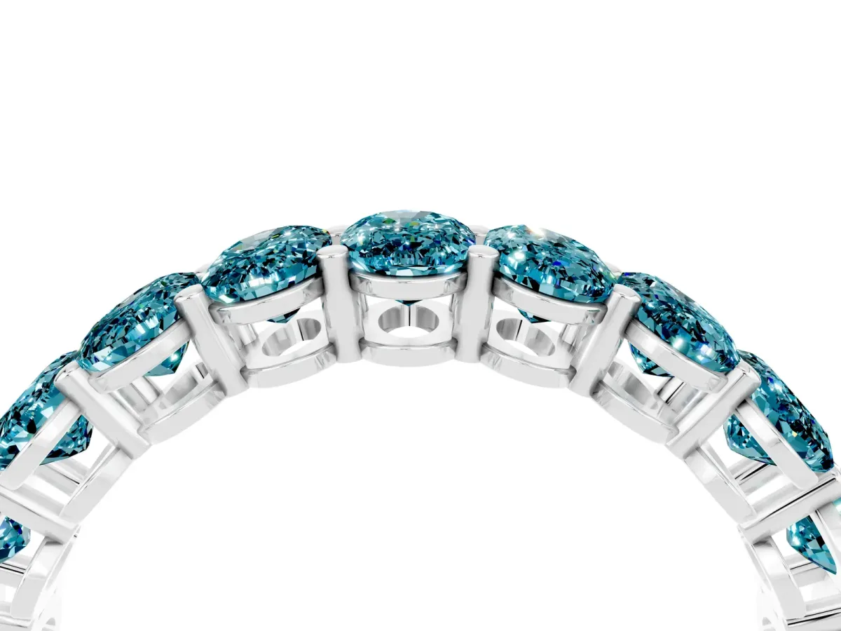 Oval Cut Blue Topaz Eternity Band with Shared Prong Setting Silver