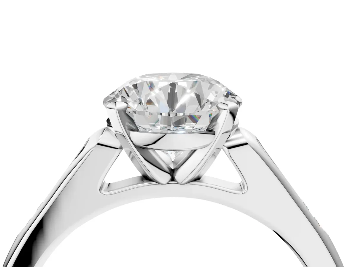 Round Cut Diamond Solitaire Ring with Channel Set Round Band and Prong Setting Platinum