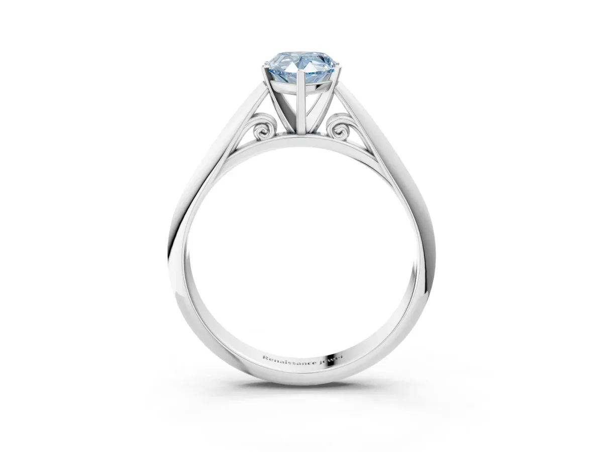 Fancy Blue Pear Cut Diamond Solitaire Engagement Ring with Cathedral Setting and Four-Prong Mount White gold