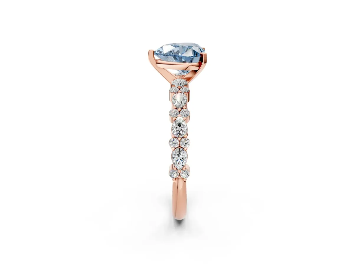 Fancy Blue Heart Cut Diamond Side Stone Solitaire Ring with Round and Four-Prong Setting Rose gold