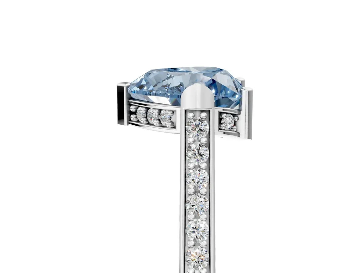 Fancy Blue Heart Cut Solitaire Diamond Ring with Channel Set Band and Bezel Prong Setting Platinum