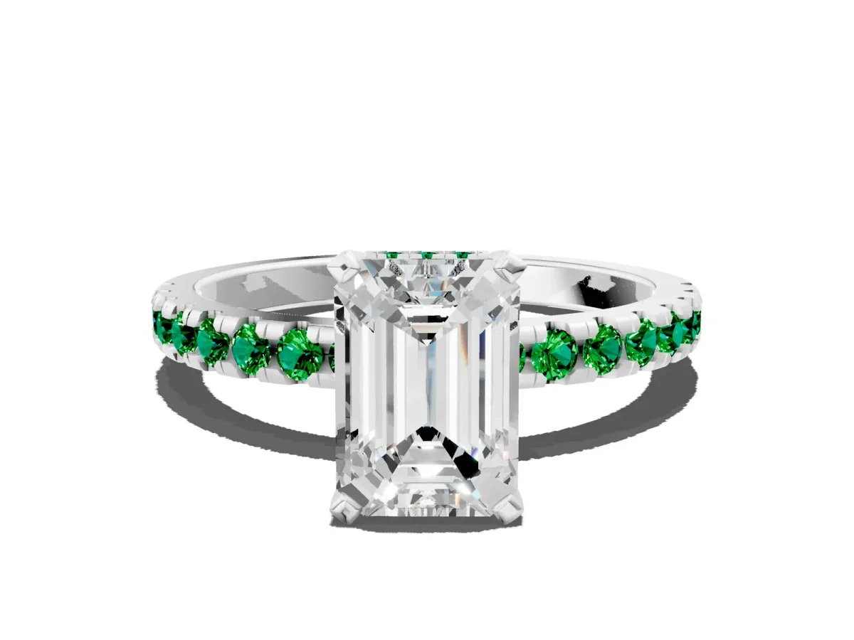 Emerald Cut Diamond Solitaire Ring with Round Emerald Pavé Band and Four-Prong Setting Silver