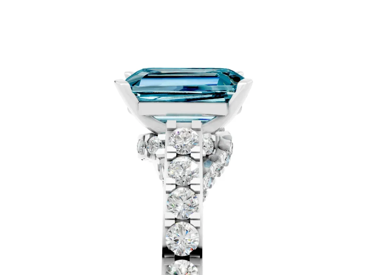 Emerald Cut Blue Topaz Solitaire Ring with Crossover Gallery and Round Pavé Band Silver
