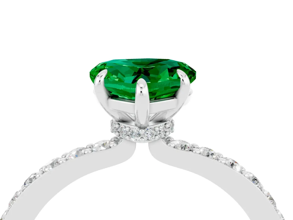 Heart Cut Emerald Solitaire Engagement Ring with Pavé Band and Four-Prong Setting Silver