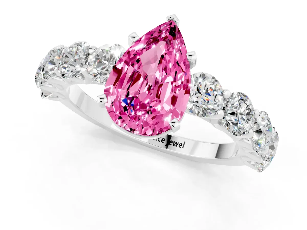 Pear Cut Pink Sapphire Prong Setting with Side Stones on a Pave Band Silver
