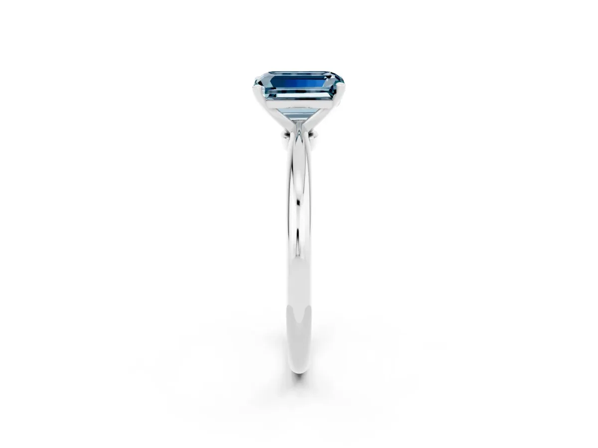 Emerald Cut Aquamarine Solitaire Ring with Six-Prong Setting and Classic Band Silver