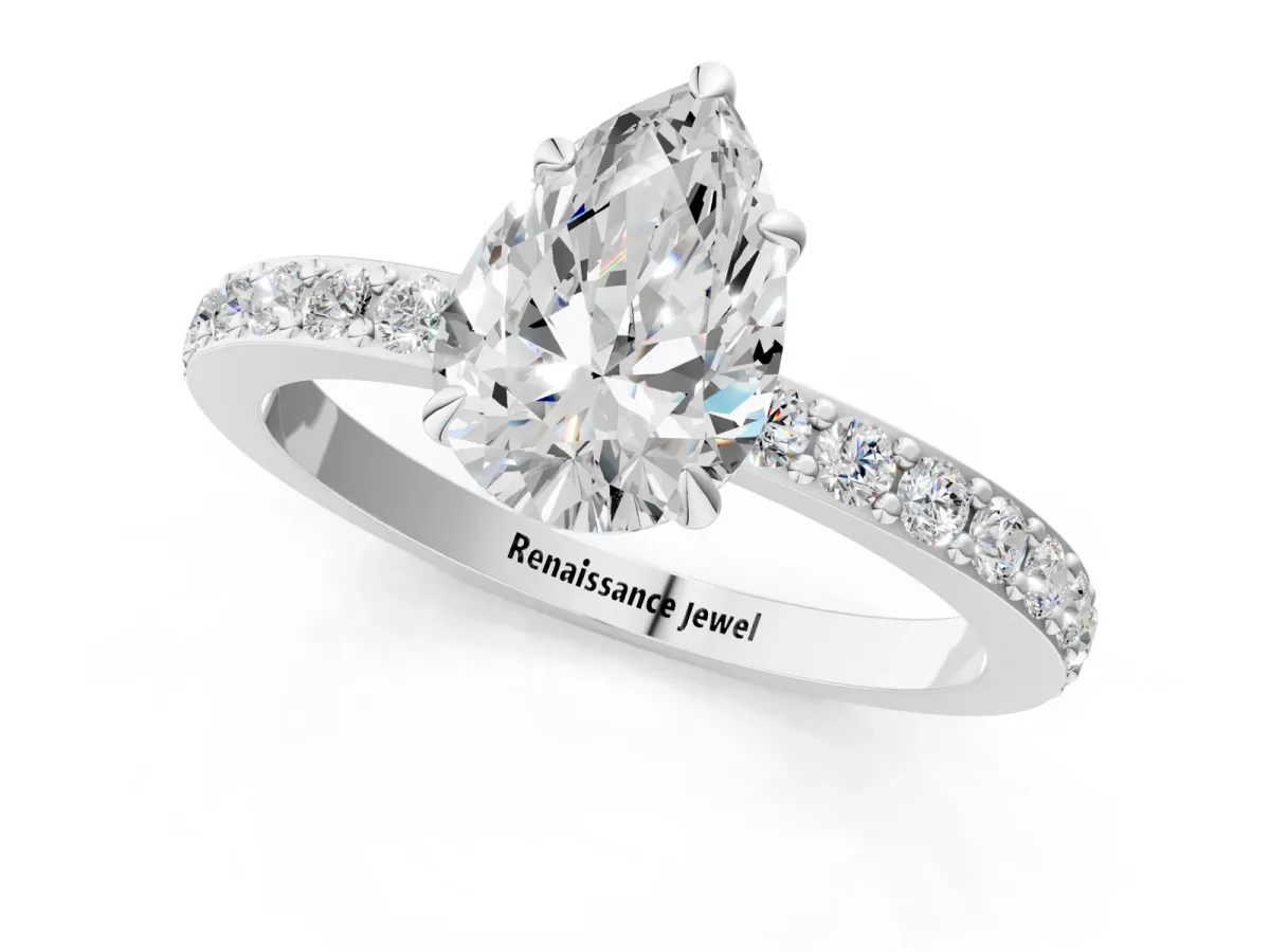 Pear Cut Diamond Solitaire Engagement Ring with Pavé Band and Four-Prong Setting Silver