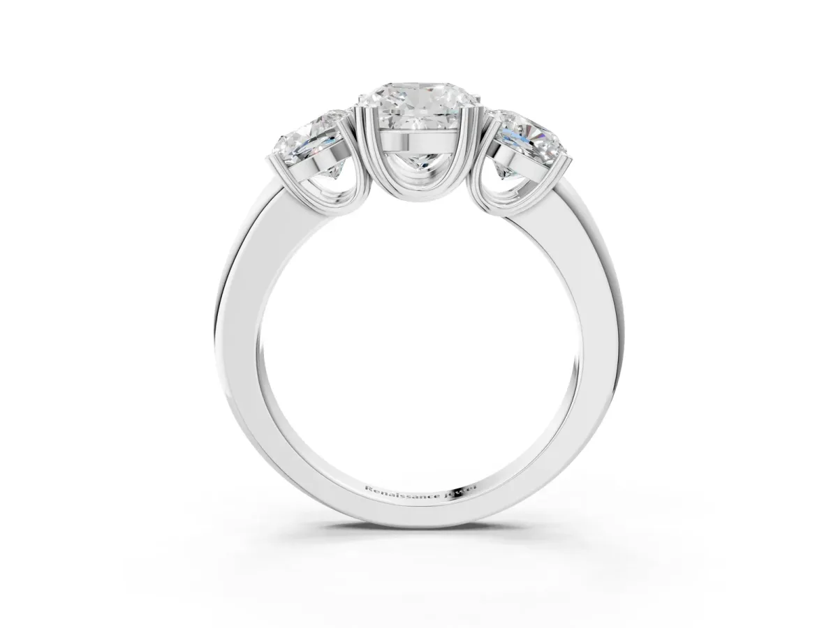 Three-Stone Cushion Cut Cut Diamond Ring with Channel Set Band and Four-Prong Setting White gold