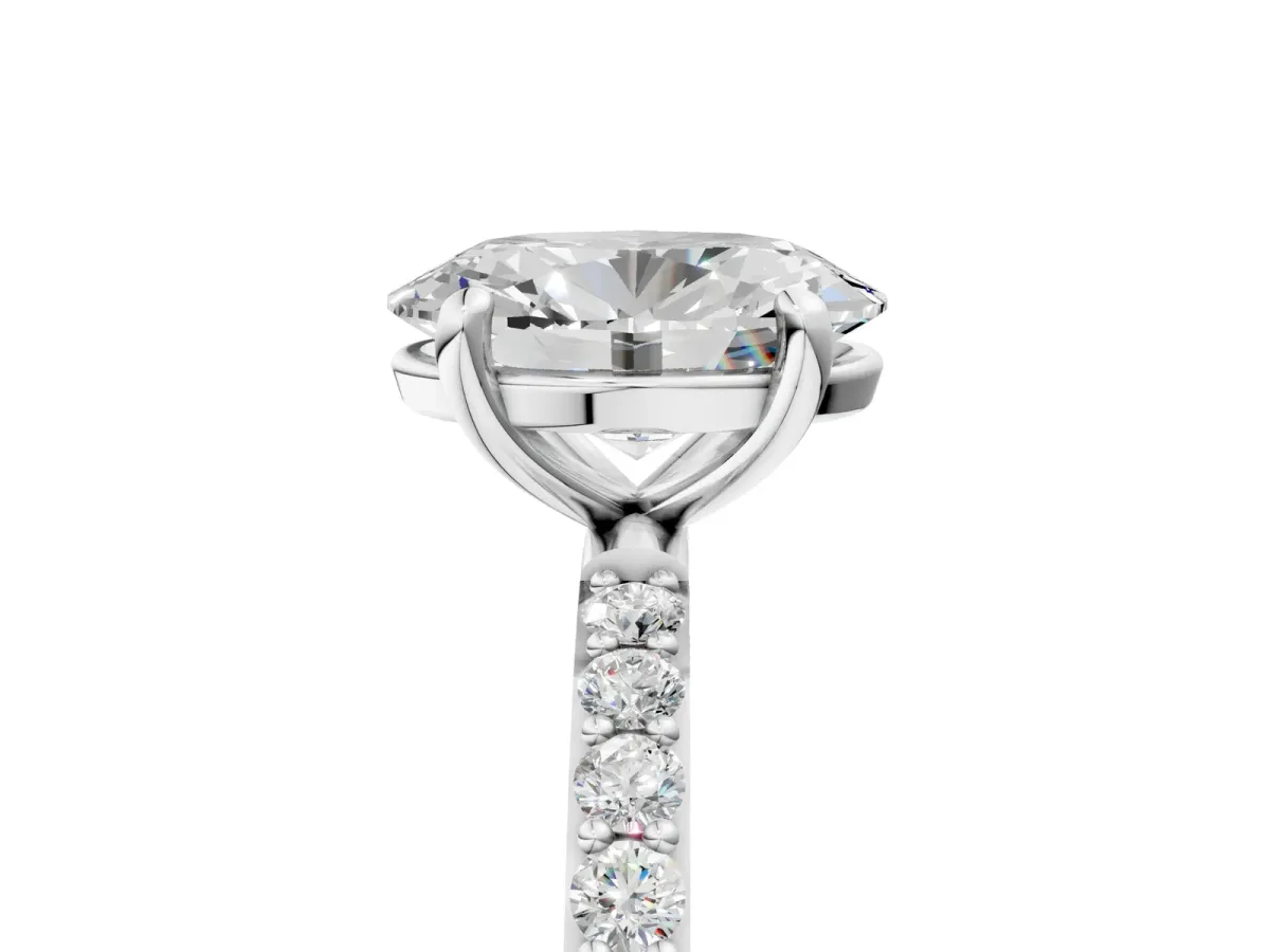 Oval Cut Diamond Solitaire Ring with Round Moissanite Pavé Band and Prong Setting Silver