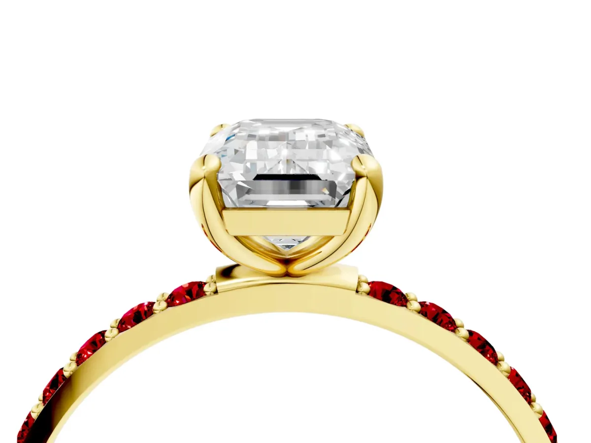 Emerald Cut Diamond Solitaire Ring with Round Ruby Pavé Band and Prong Setting Yellow gold