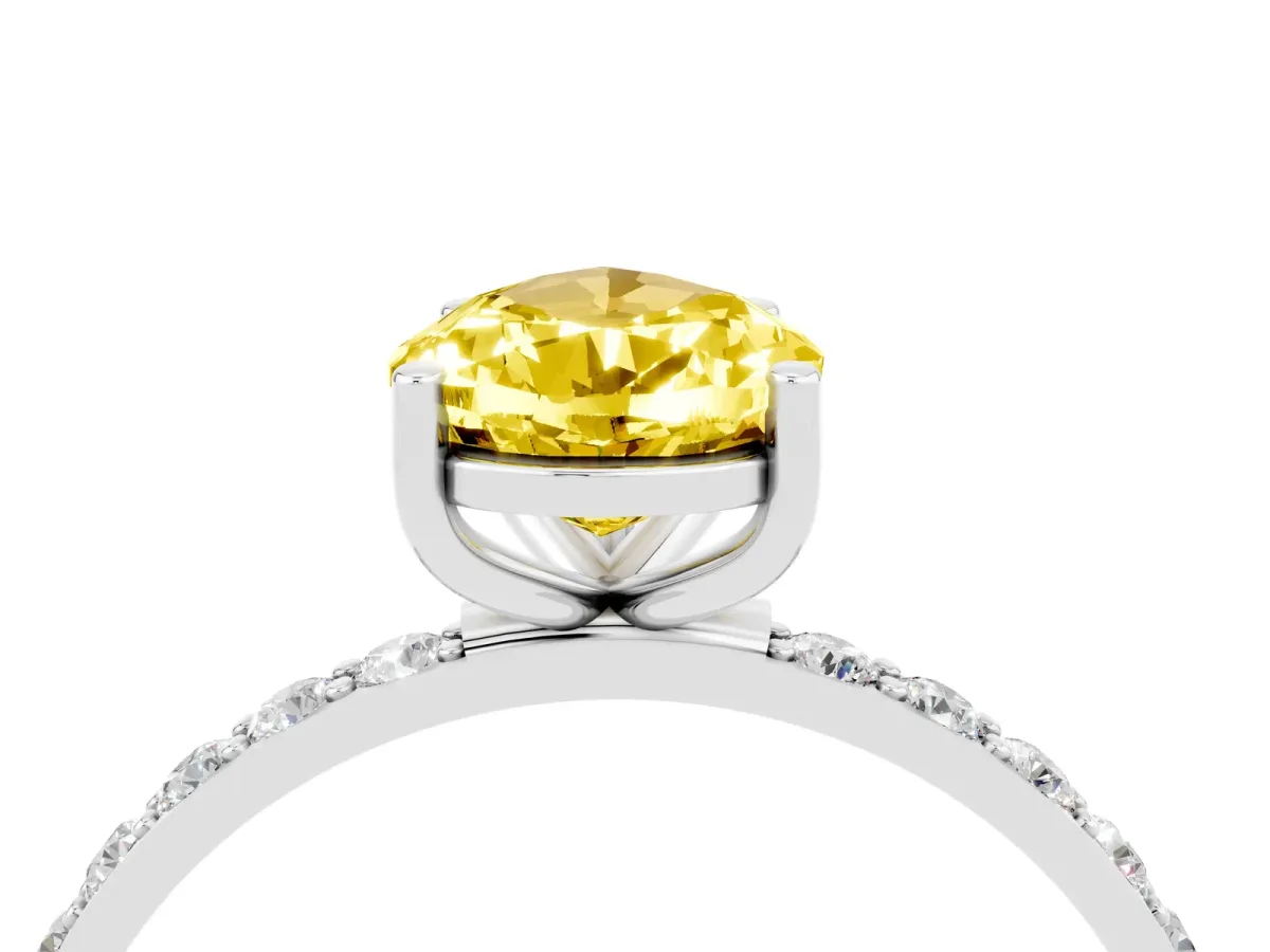 Pear Cut Yellow Sapphire Solitaire Ring with Round Pavé Band and Prong Setting Silver