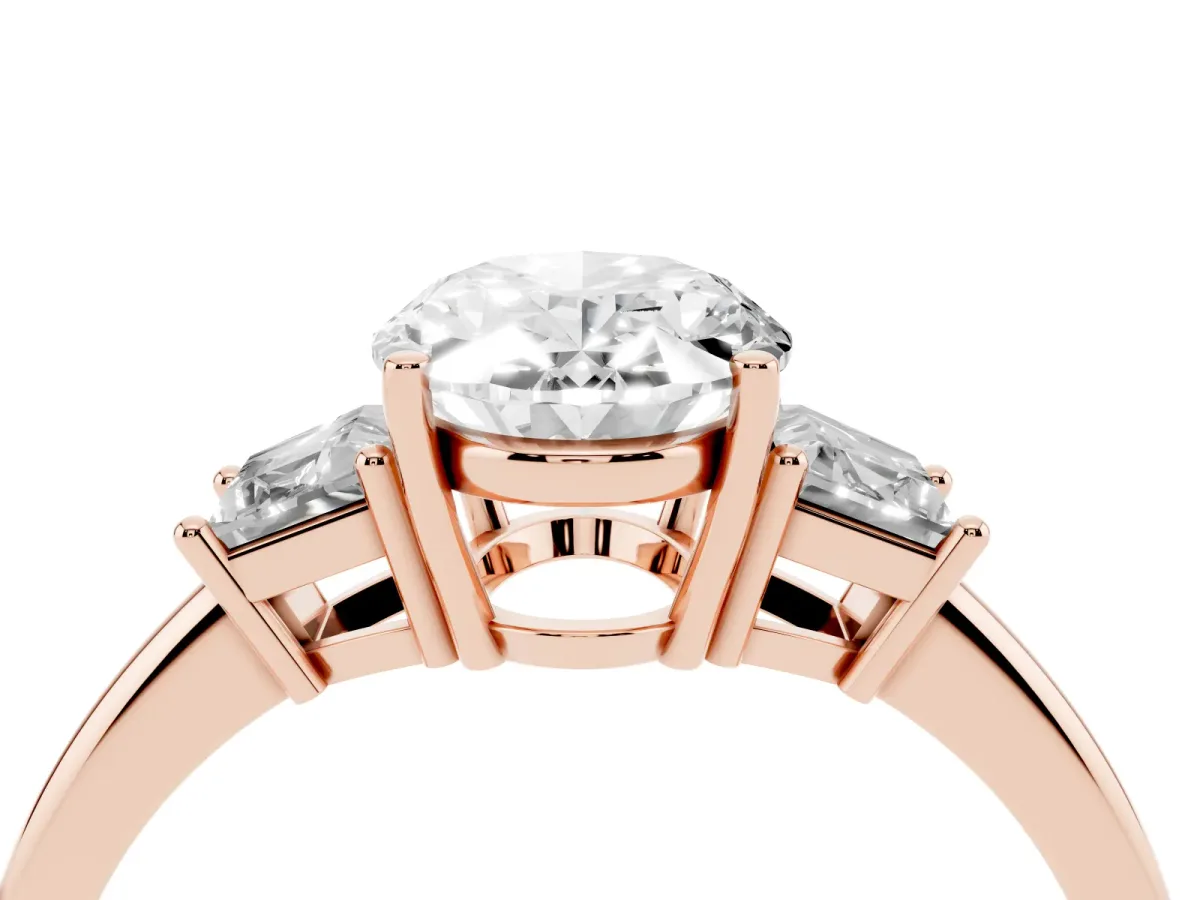 Oval Cut Diamond Three-Stone Ring with Trapezoid Side Stones and Prong Setting Rose gold