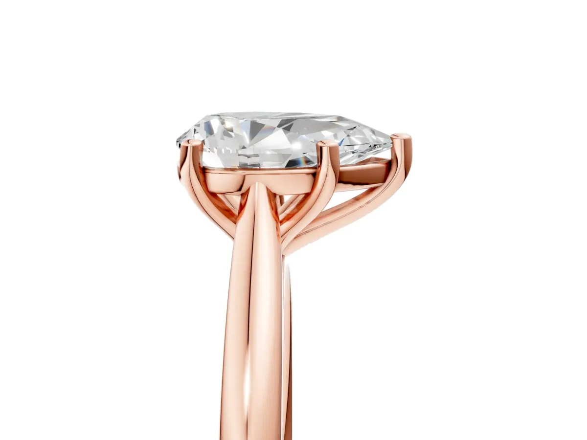 Pear Cut Cut Solitaire Ring with Cathedral Band and Four-Prong Setting Rose gold