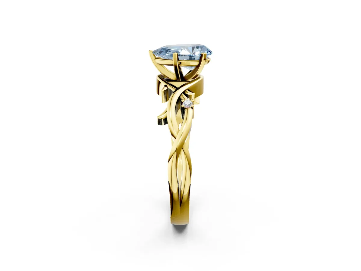 Fancy Blue Pear Cut Diamond Solitaire Ring with Twisted Band and Prong Setting Yellow gold