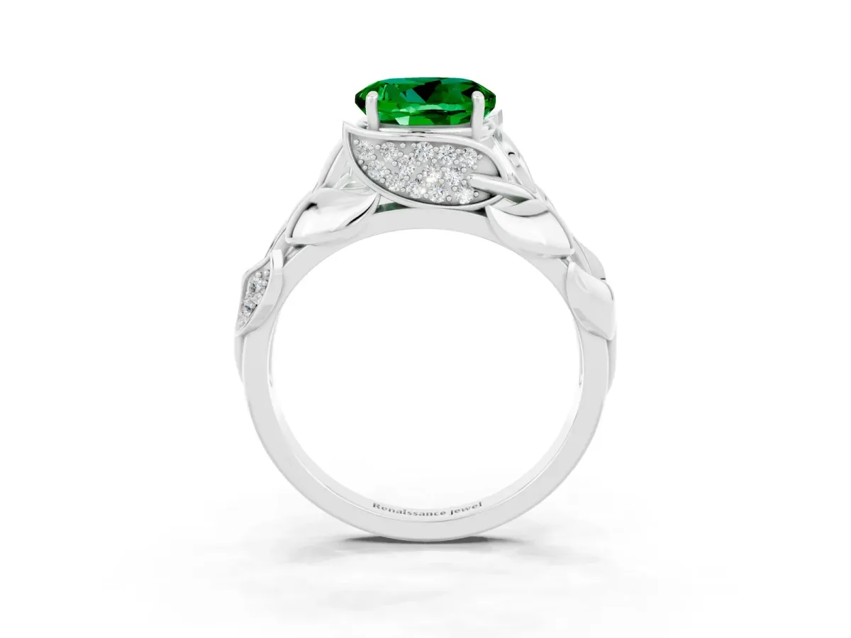 Round Cut Emerald Leaf-Inspired Engagement Ring with Round Accents and Prong Setting Silver
