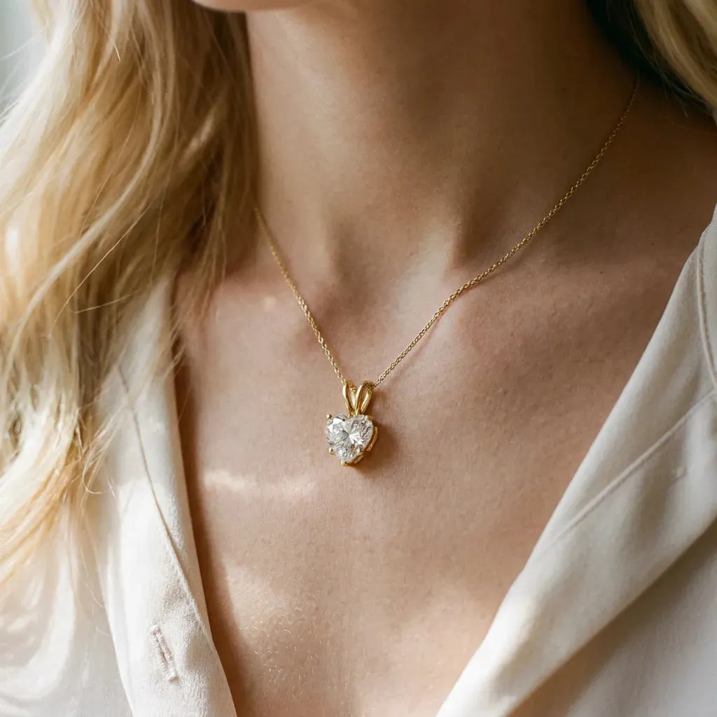 Heart-Shaped Diamond Solitaire Pendant with Four-Prong Setting Yellow gold