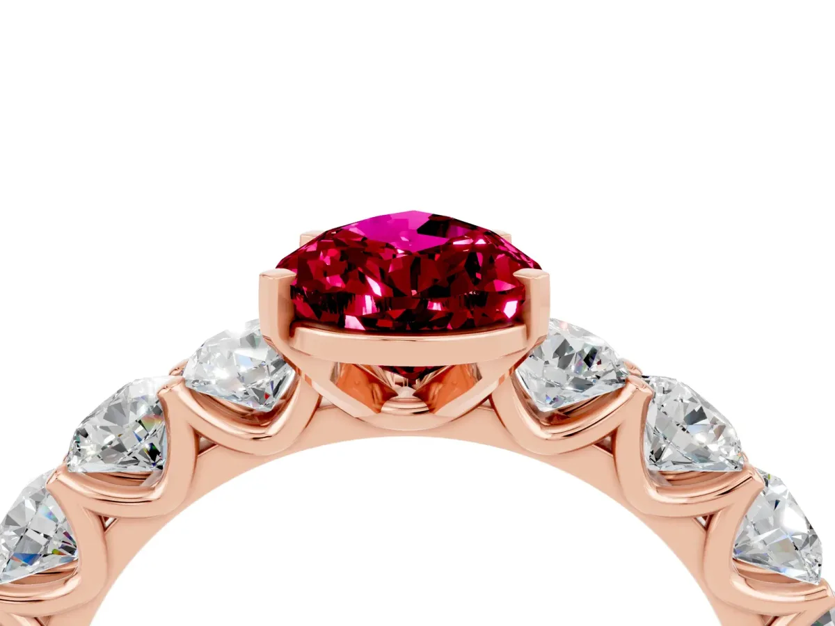 Pear Cut Garnet Prong Setting with Side Stones on a Pave Band Rose gold