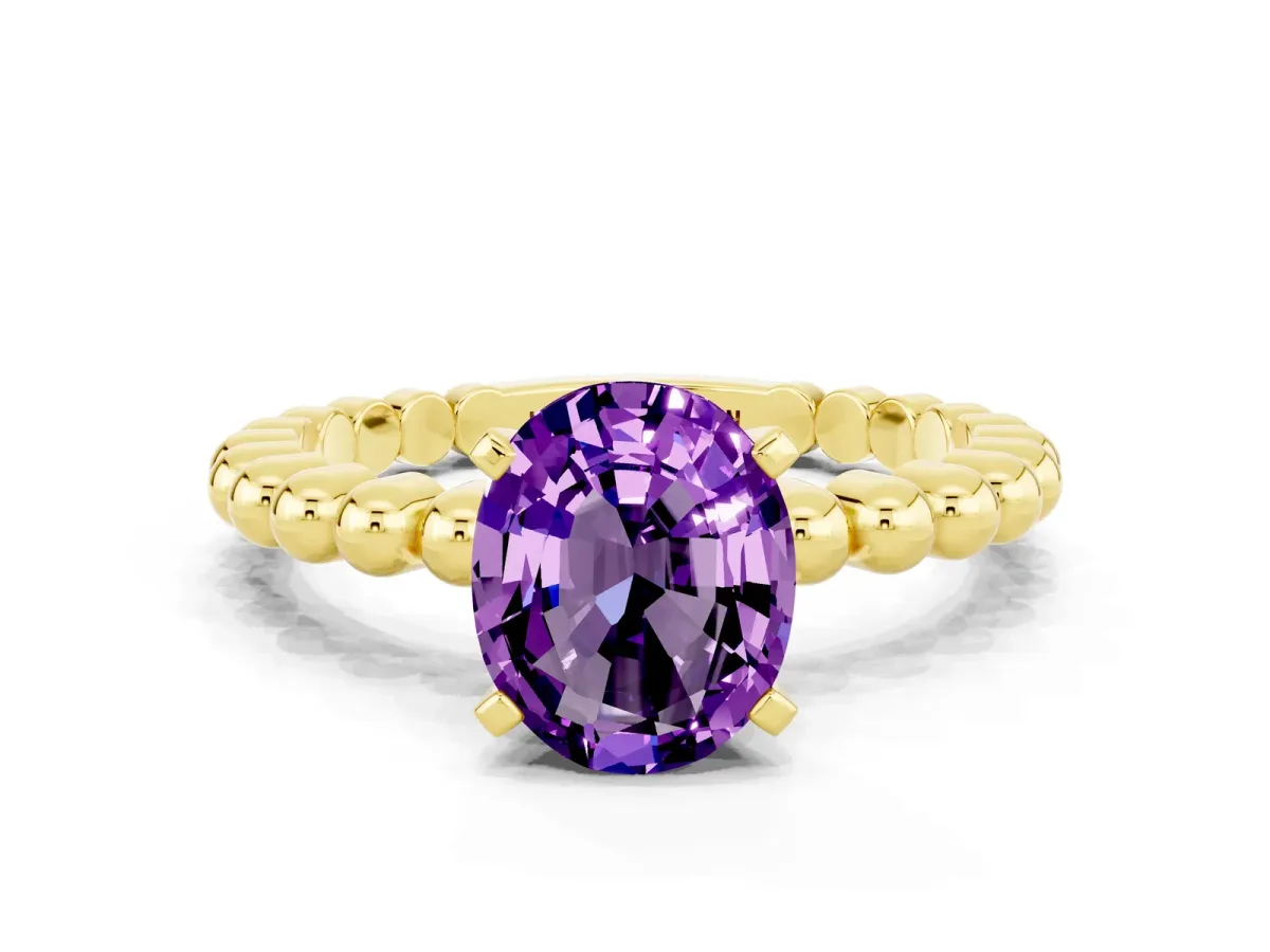 Oval Cut Amethyst Solitaire Ring with Beaded Band and Prong Setting Yellow gold