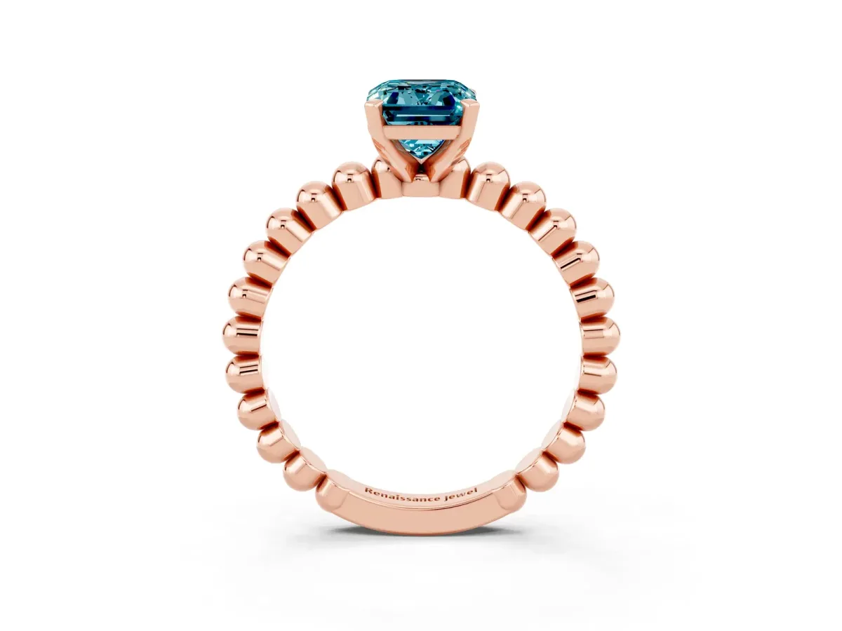 Emerald Cut Blue Topaz Solitaire Ring with Beaded Band and Prong Setting Rose gold