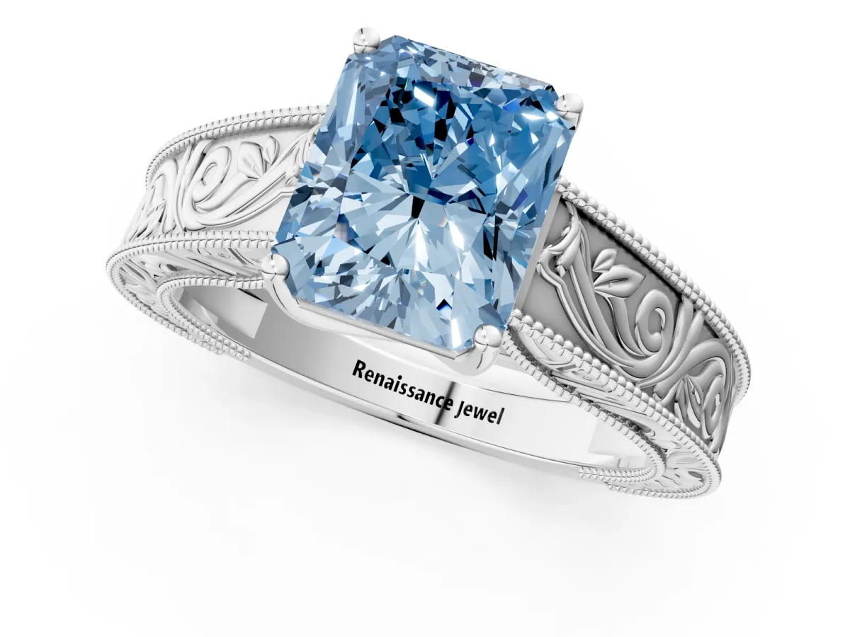 Fancy Blue Radiant Cut Diamond Solitaire Ring with Engraved Band and Four-Prong Setting Platinum