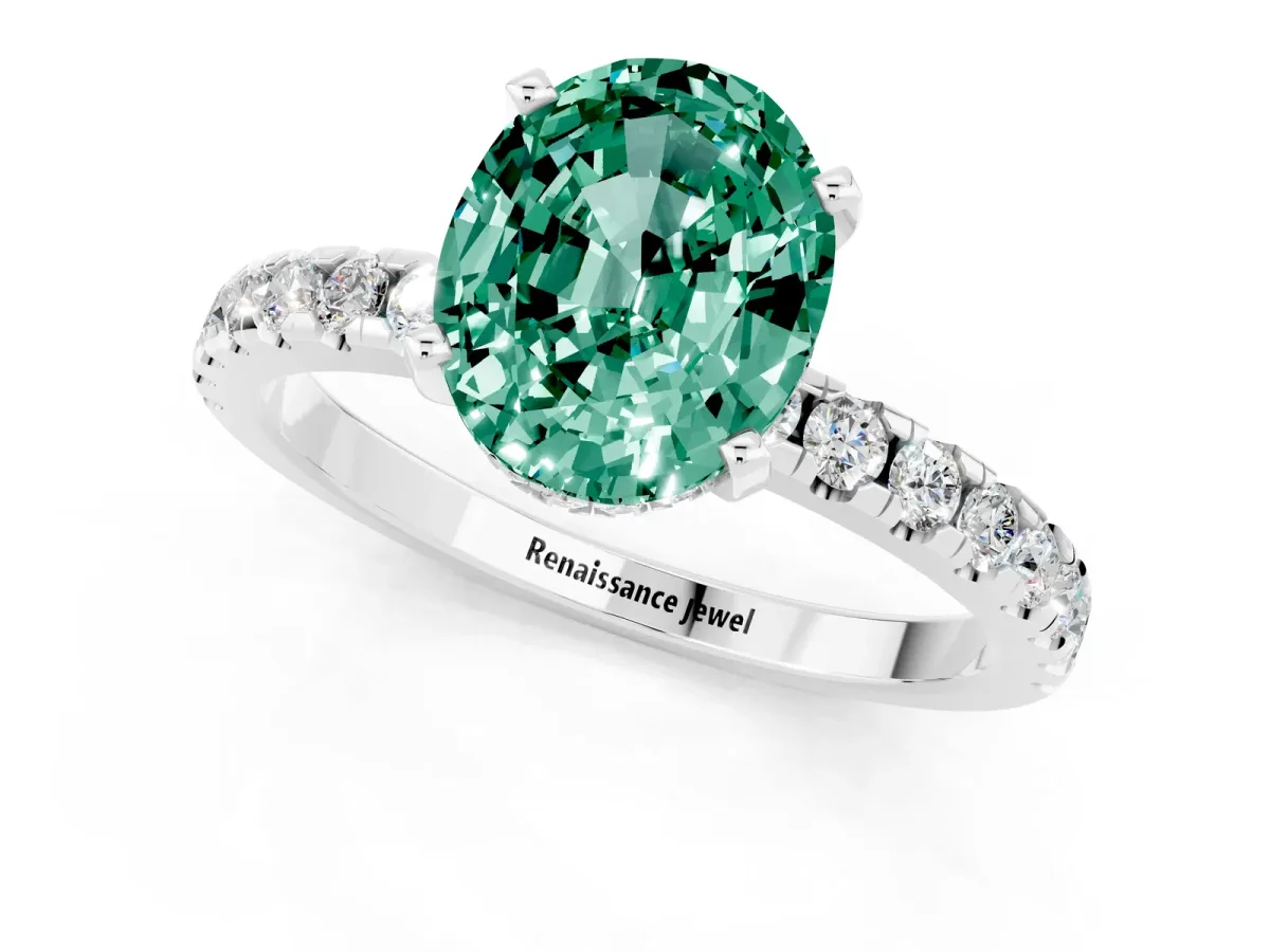 Oval Cut Green Sapphire Solitaire Ring with Round Pavé Band and Four-Prong Setting Silver