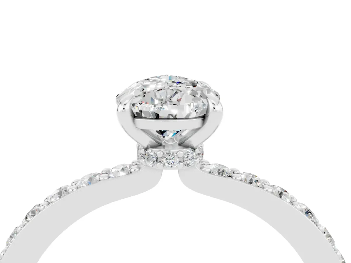 Pear Cut Moissanite Solitaire Engagement Ring with Pavé Band and Four-Prong Setting Silver