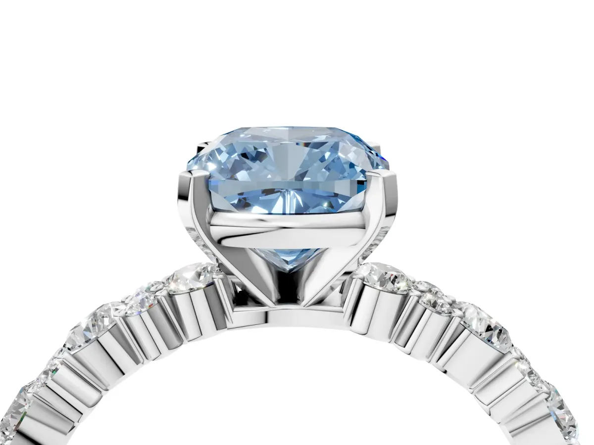 Fancy Blue Cushion Cut Diamond Side Stone Solitaire Ring with Round and Four-Prong Setting White gold