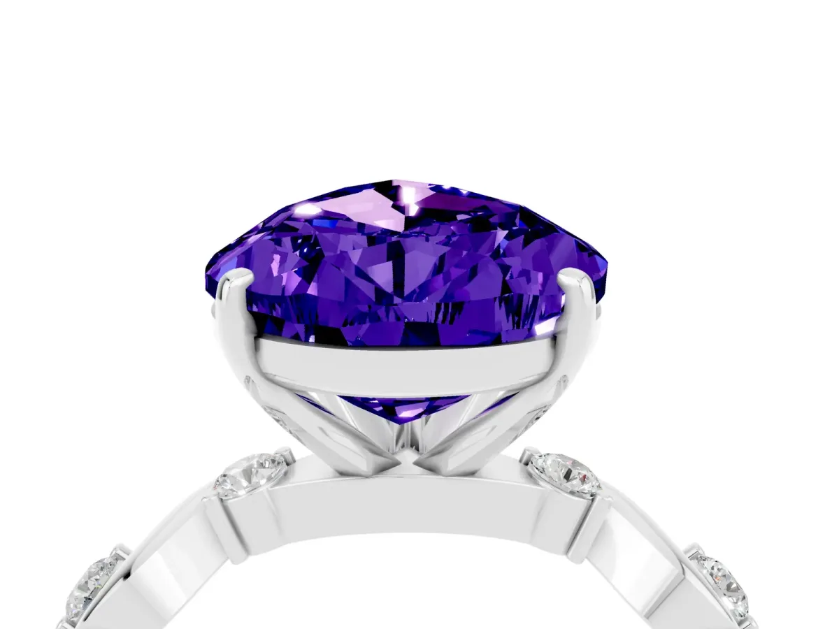 Pear Cut Tanzanite Solitaire Twisted Band with Round Accents and Prong Setting Silver