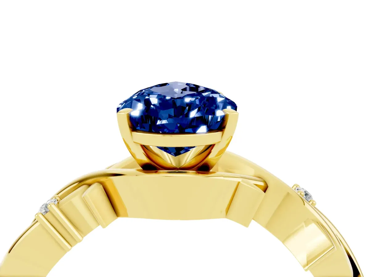 Pear Cut Blue Sapphire Solitaire Ring with Twisted Band and Prong Setting Yellow gold