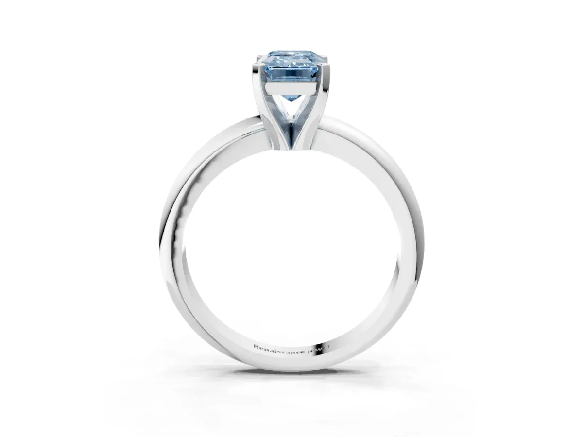 Fancy Blue Emerald Cut Diamond Solitaire Engagement Ring with Round Band and Four-Prong Setting Silver