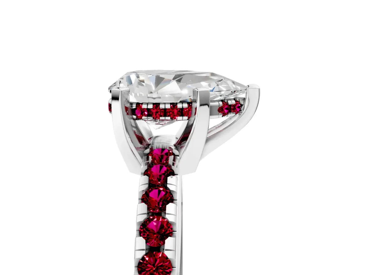 Pear Cut Diamond Solitaire Ring with Round Garnet Pavé Band and Four-Prong Setting Silver