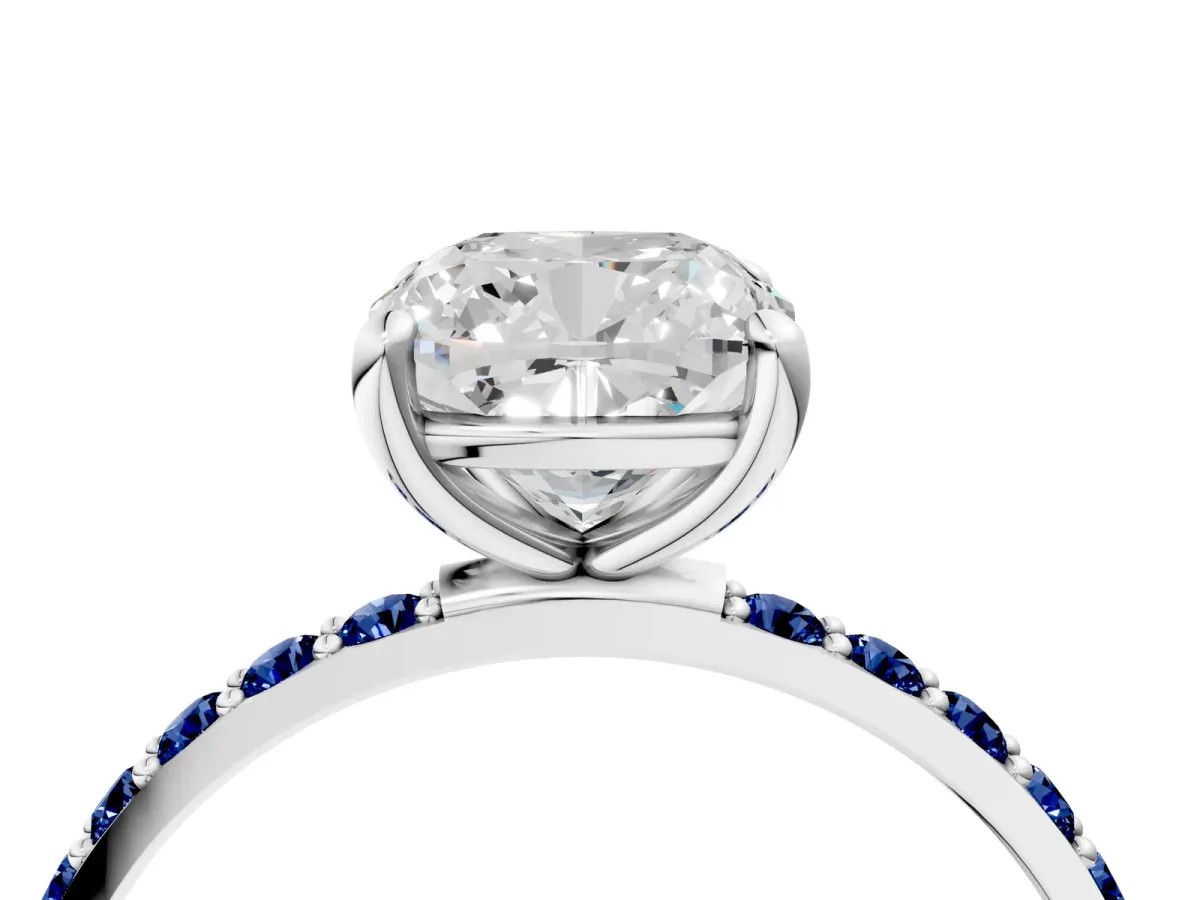 Cushion Cut Diamond Solitaire Ring with Round Blue Sapphire Pavé Band and Prong Setting Silver