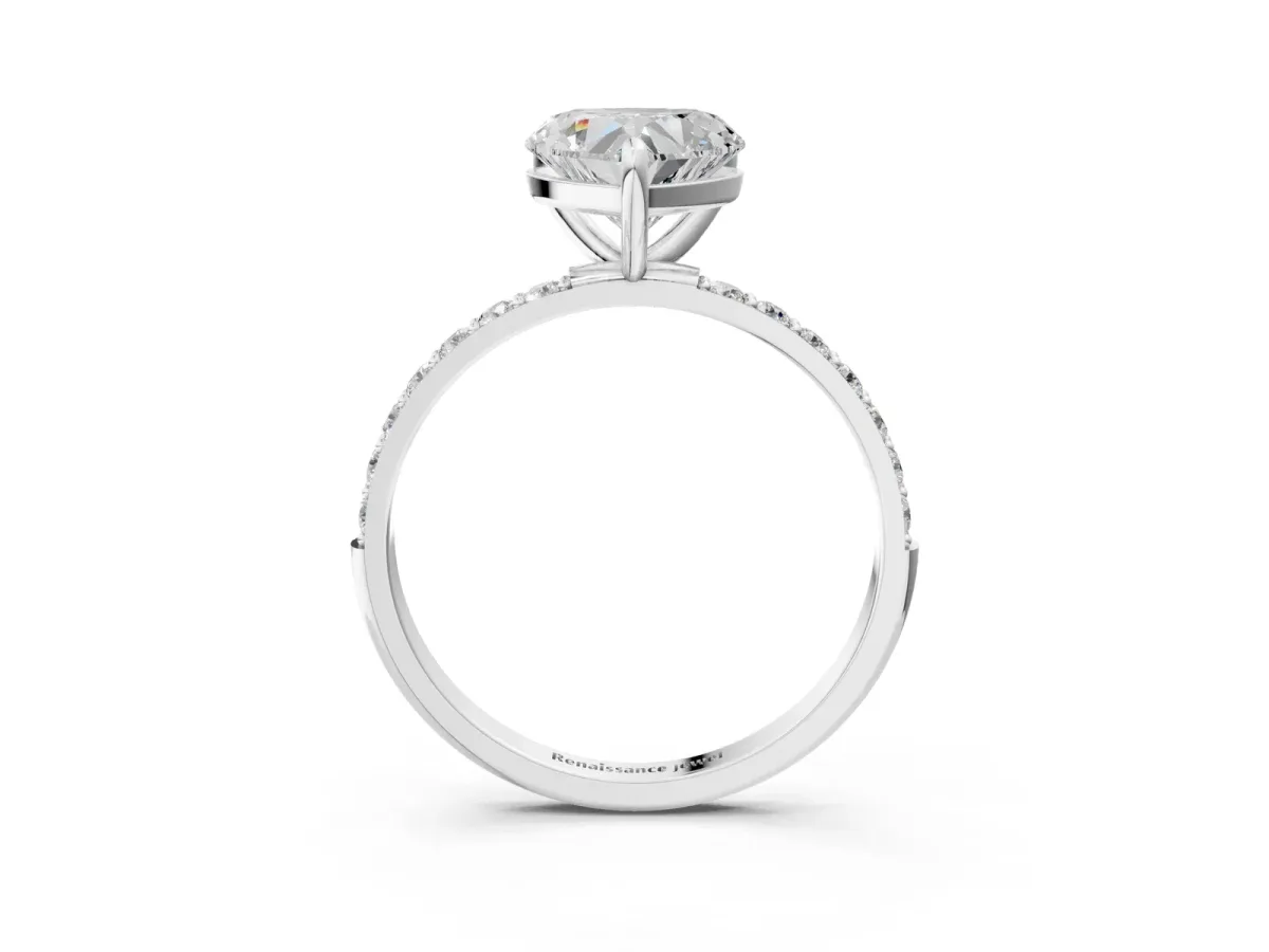 Heart Cut Diamond Solitaire Ring with Round Pavé Band and Prong Setting Silver