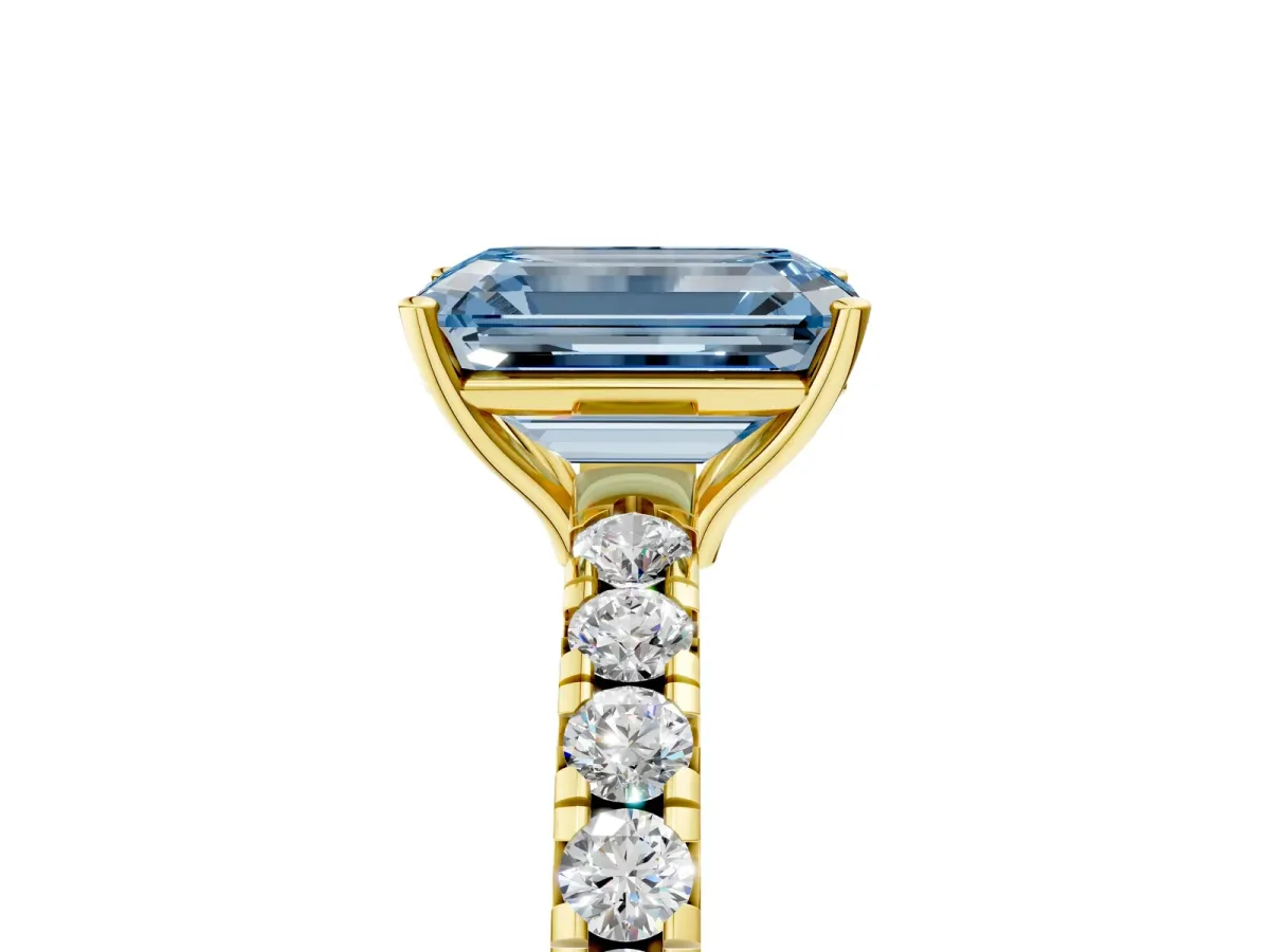 Fancy Blue Emerald Cut Diamond Pavé Solitaire Engagement Ring with Four-Prong Setting Yellow gold