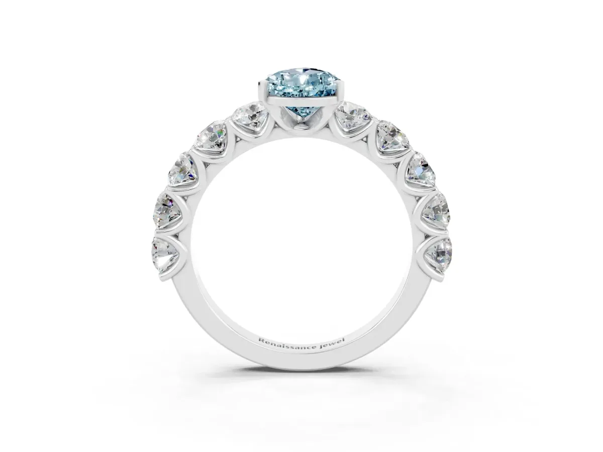Pear Cut Aquamarine Prong Setting with Side Stones on a Pave Band Silver