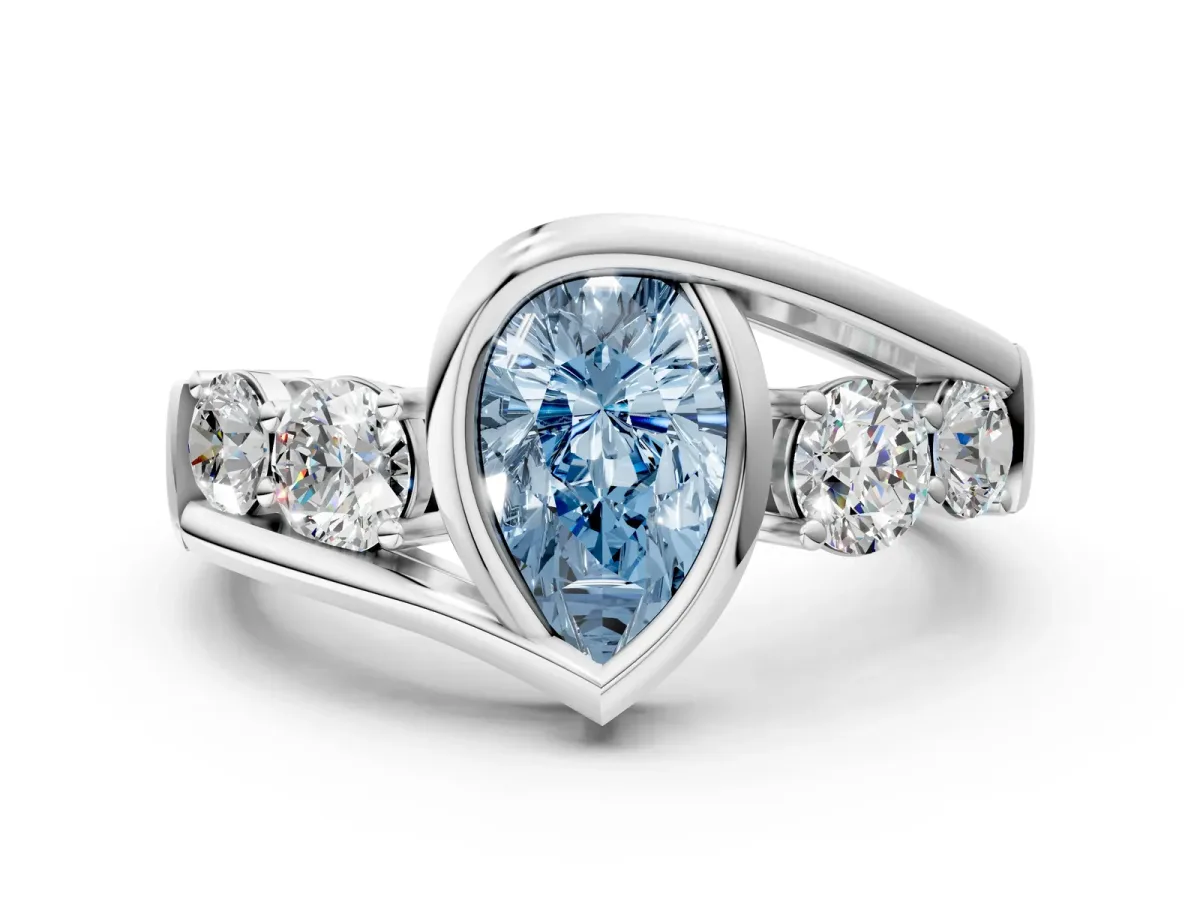Fancy Blue Bezel Set Pear Cut Diamond Bypass Ring with Round Accents Silver