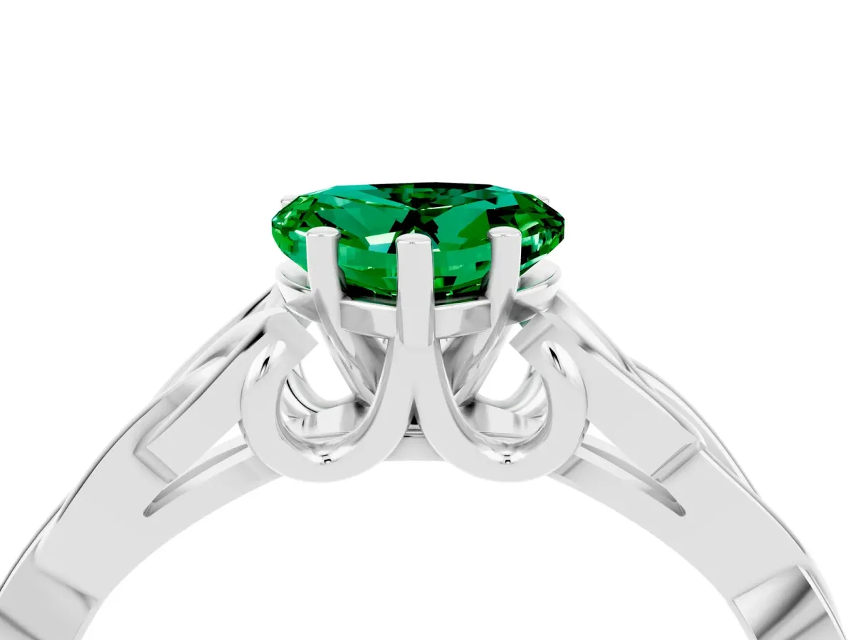 Heart Cut Emerald Solitaire Engagement Ring with Celtic Knot Band and Four-Prong Setting Silver